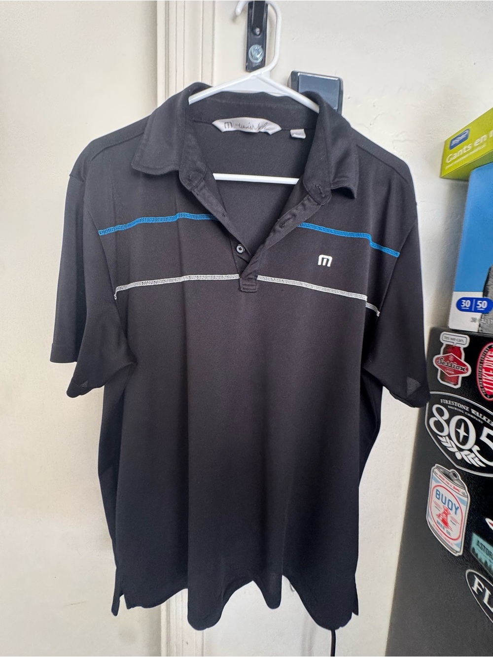 Men's Black Travis Mathew Performance Polo with Blue Accent